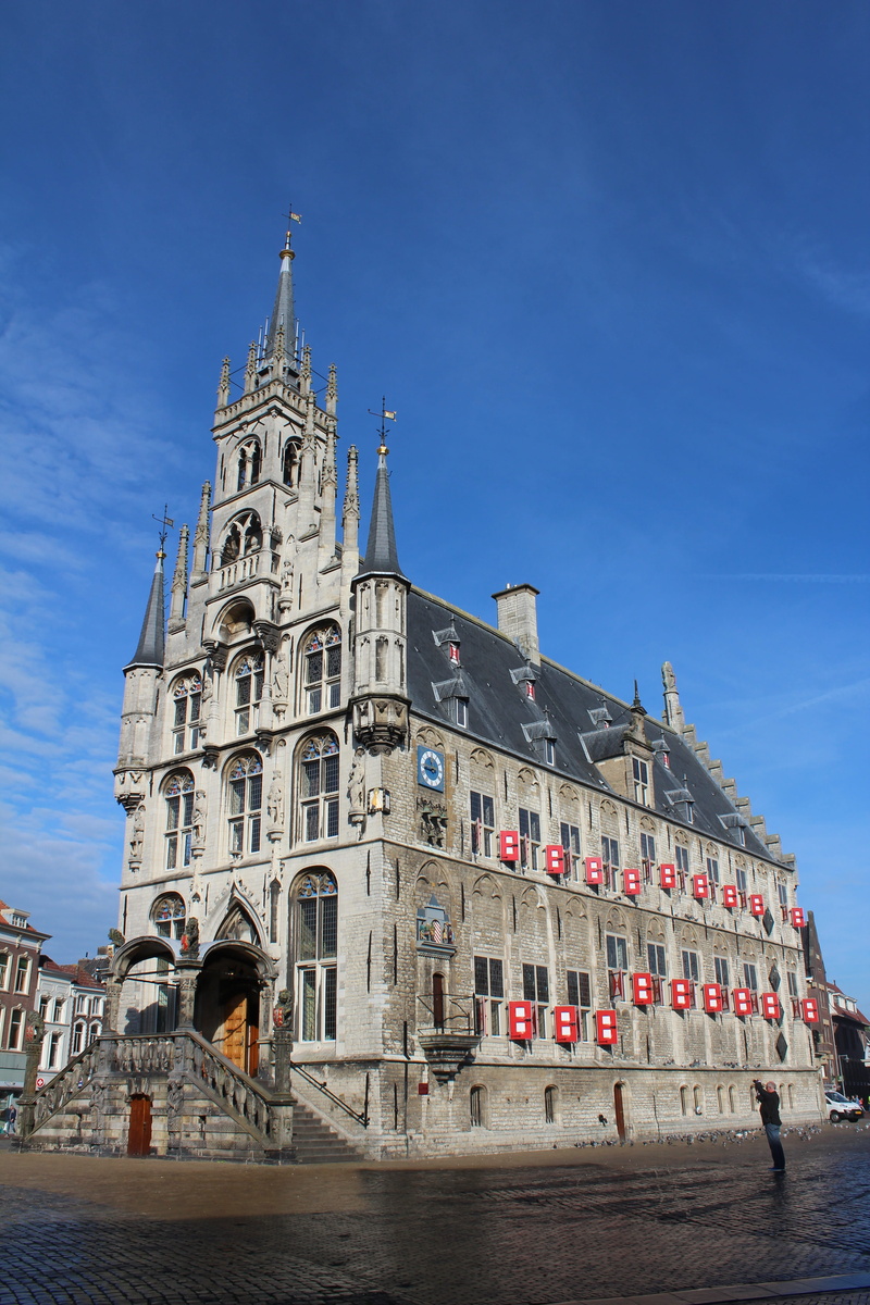 spirituality, travel destinations, history, historic building, outdoors, netherlands, place of worship, arch, town hall, religion, monument, market, the past