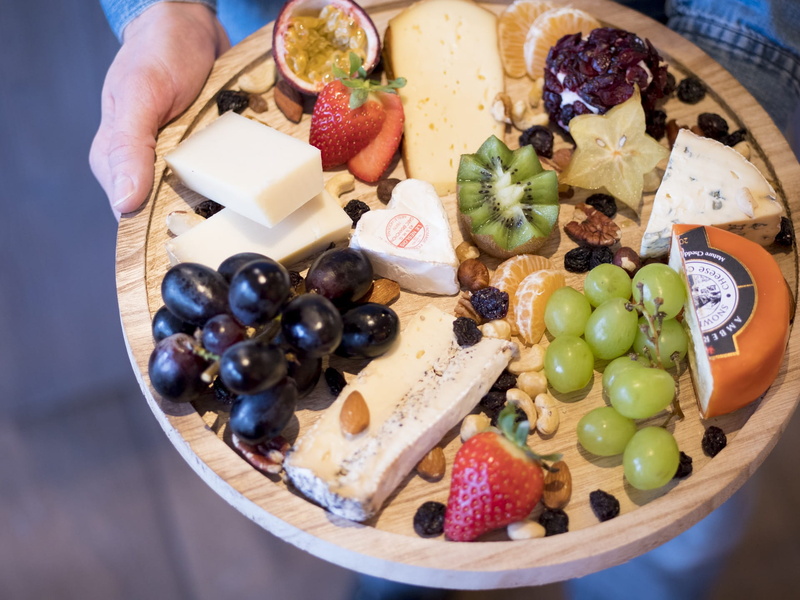 human body part, berry fruit, succulent, high angle view, ready-to-eat, roquefort, healthy eating, grape, blueberry, hand, wine, fruit, cheese, indoors