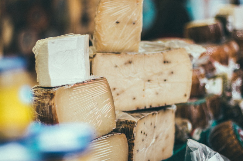 day, stack, bricks, large group of objects, wood - material, container, dairy product, cheese, food, close-up, market, store, filed, focus on foreground