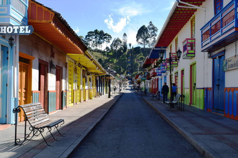 alley, absence, colors, tourism, wall, white, seat, in a row, town, the way forward, house, built structure, row house, diminishing perspective, street