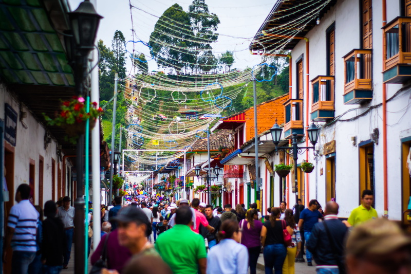 built structure, residential district, city, colorful, lifestyles, day, building, leisure activity, large group of people, women, real people, street, building exterior