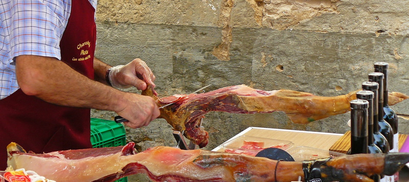 meat, outdoors, preparation, farmers local market, man, one person, market, human hand, market stall, freshness, occupation, fleischer, delicacy, butcher