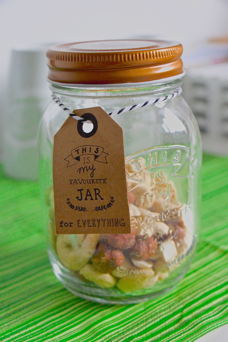 dried fruit, text, close-up, container, 5K, western script, storage, glass jar, healthy eating, finance, still life, vegetable, store, communication, indoors