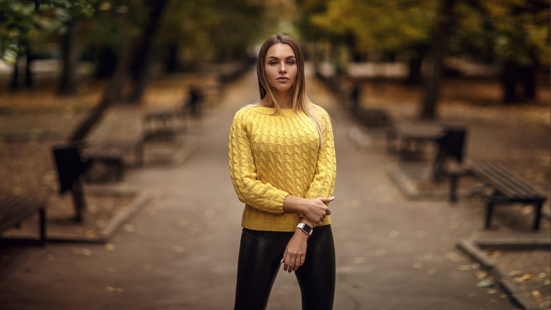 leisure activity, outdoors, lifestyles, leather pants, young adult, three quarter length, yellow sweater, black pants, tree, beautiful woman, fall, women