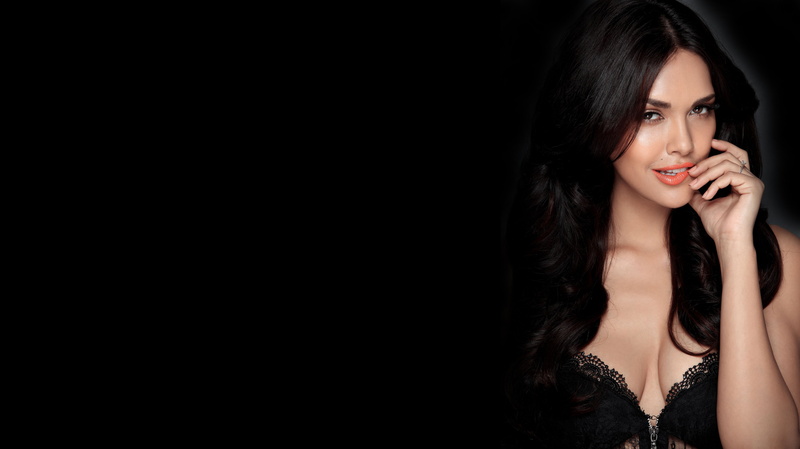 hair, beauty, hairstyle, indoors, glamour, young adult, brown hair, adult, body part, luxury, black hair, hand, black background, portrait, studio shot