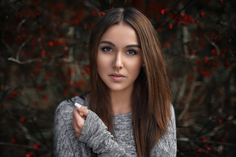 sweater, headshot, straight hair, young adult, autumn, front view, clothing, women, depth of field, portrait, outdoors, model, one person, human face, fashion
