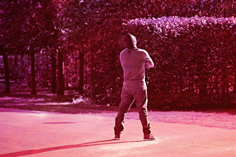 shorts, road, standing, men, fantasy, aggression, raised head, lifestyles, folded arms, athlete, day, competition, 4K, adult, motion, man, red, rear view