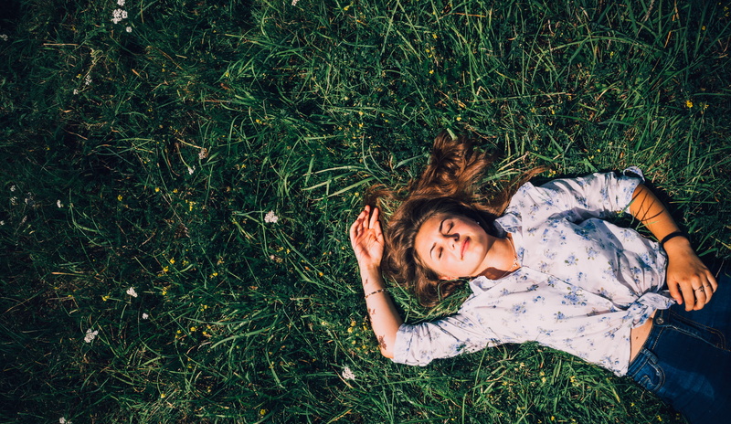young women, plant, casual clothing, young adult, green color, jeans, photo shoot, denim, contemplation, lying on back, leisure activity, pants, beauty in nature