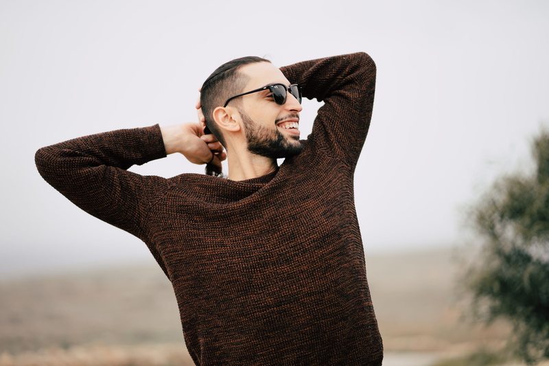 beautiful people, one person, long, brown, black, framed, hands behind head, leisure activity, adult, waist up, leisure activities, looking, sleeved, front view