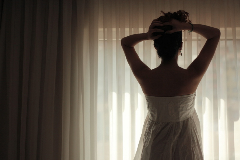 Girl, window, standing, 2K, women, arms raised, young adult, rear view, Curtains, day, hands behind head, hand in hair, Shadow, depression - sadness, one person