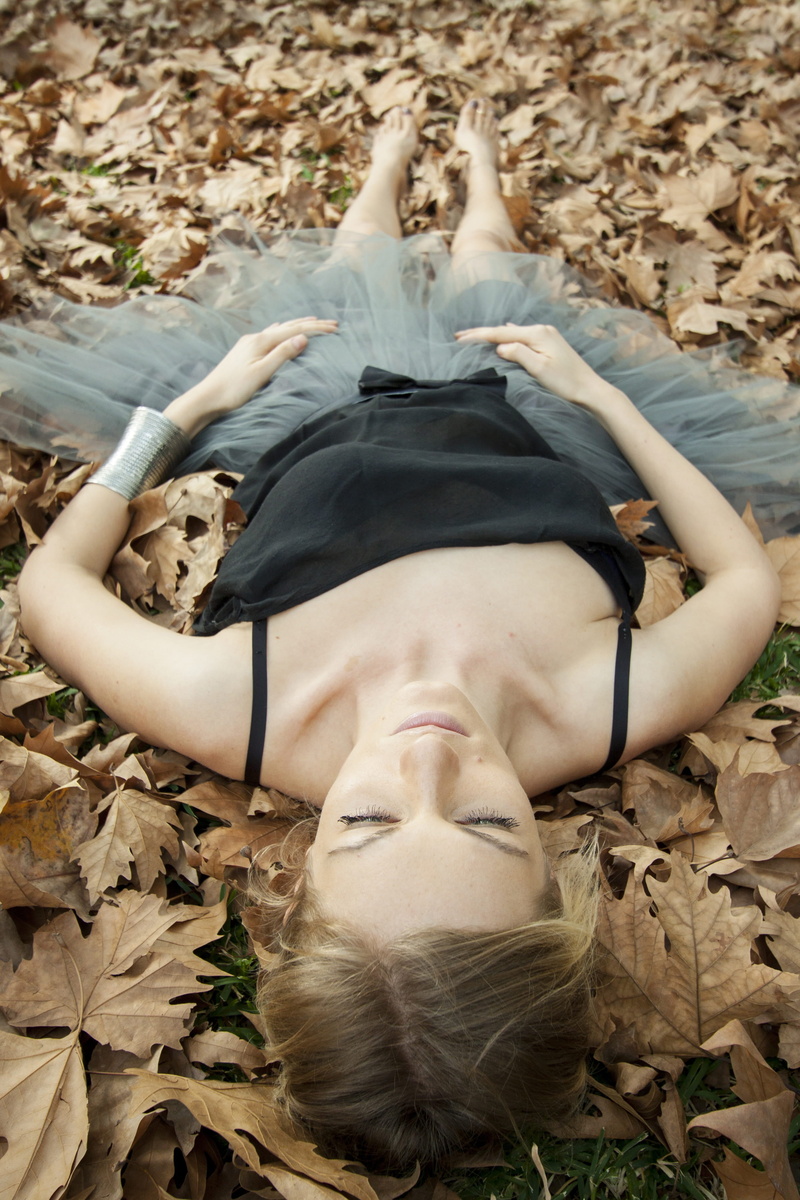 front view, lifestyles, day, teenager, adults only, black, gray, dead, high angle view, fine arts, brown, lying down, autumn, woman, human, people, nature