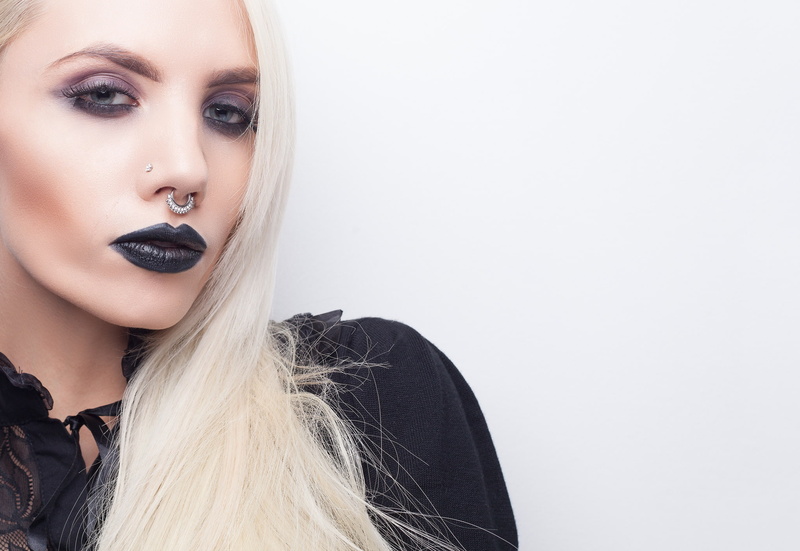 human hair, adult, studio shot, model, pierced nose, young adult, fashion, lipstick, human body part, beauty, hairstyle, piercing, one person, beautiful people