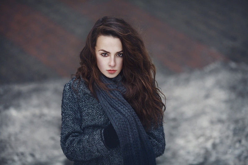 teenager, grey coat, hair, long hair, leisure activity, looking at camera, young adult, warm clothing, lifestyles, standing, brunette, one person, outdoors