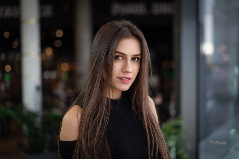beauty, hair, contemplation, beautiful woman, city, standing, young women, face, smiling, front view, looking at camera, adult, focus on foreground, bare shoulders