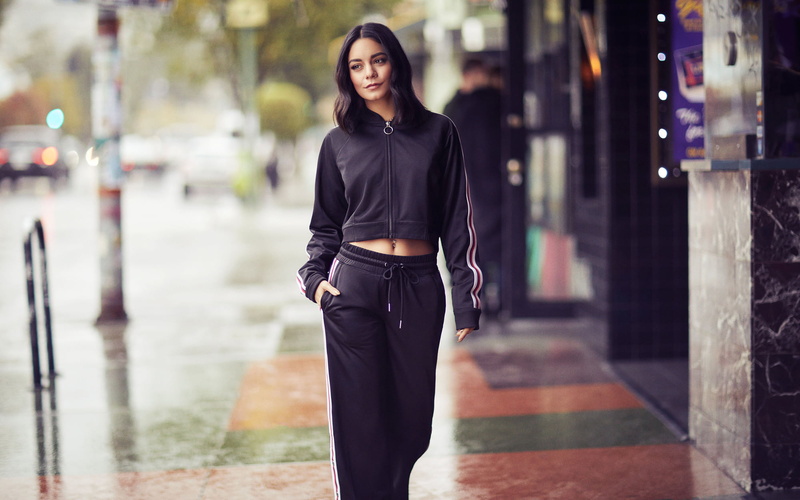 actress, depth of field, urban, 1080P, shoulder length hair, city, women, hands in pockets, black clothing, Vanessa Hudgens, belly button, street, walking