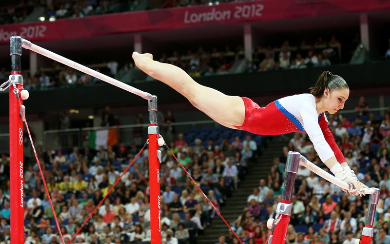 real people, bars, competition, world champion, audience, white, Aliya Mustafina, people, Olympic champion, women, gymnast, face, figure, legs, focus on foreground