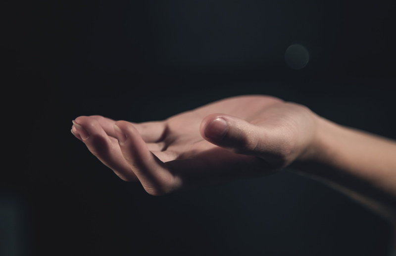 body part, indoors, studio shot, close-up, background, palm, human limb, focus on foreground, woman, light, limb, black, tattoo, hand in hand, finger, people