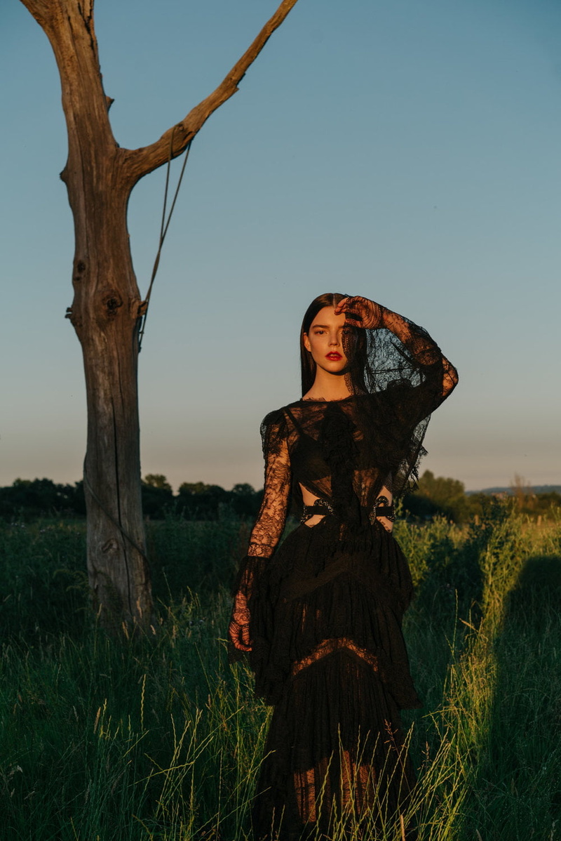 dark hair, 720P, clear sky, women, nature, black dress, sky, tree trunk, brunette, see-through dress, Anya Taylor-Joy, actress, grass