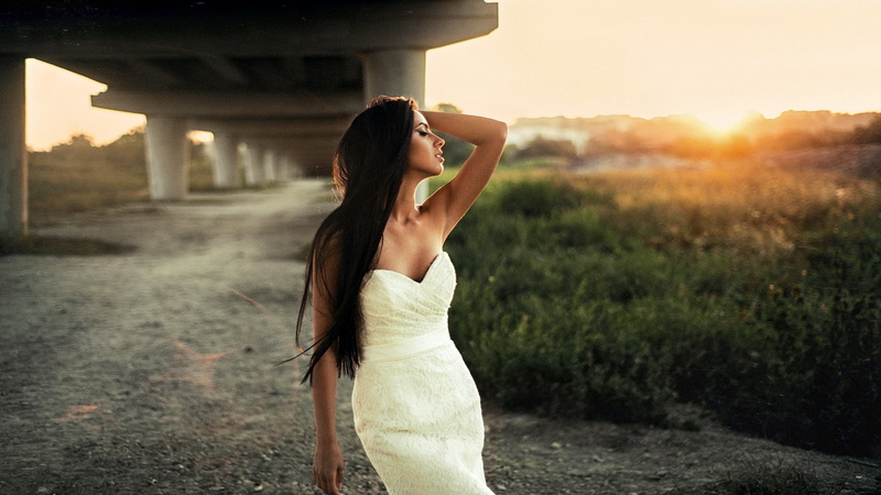 adult, sunlight, lifestyles, outdoors, straight hair, depth of field, lens flare, young adult, closed eyes, waist up, architecture, brunette, women, women outdoors