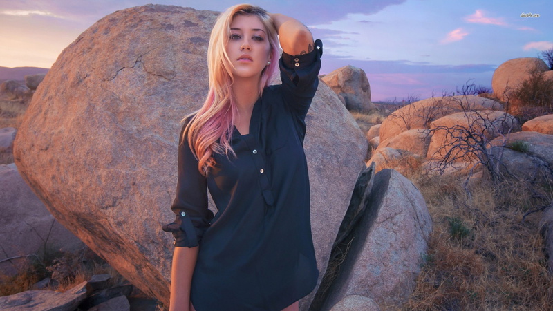 rock formation, solid, women, young women, outdoors, leisure activity, mountain, hairstyle, see-through clothing, rock, real people, young adult, front view