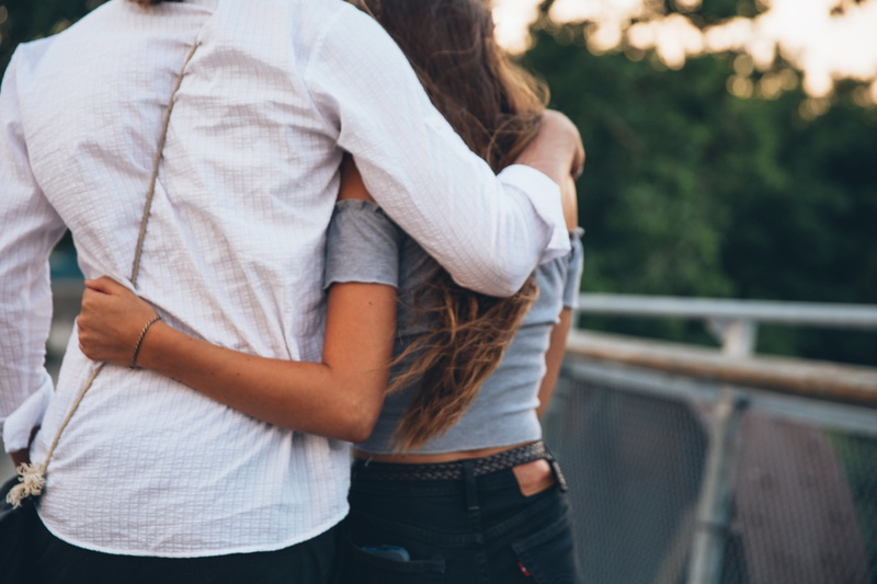 couple - relationship, real people, railing, photo, leisure activity, embrace, 4K, togetherness, standing, Friends, adult, midsection, young adult, hairstyle
