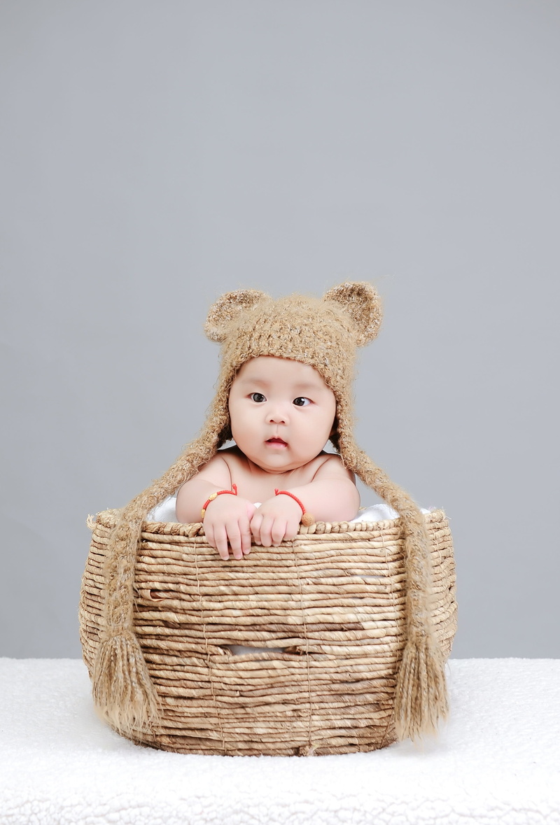 stuffed toy, baby, cute, representation, brown, kids, studio shot, naive, indoors, innocence, toy, container, one person, the little girl, wicker, portrait