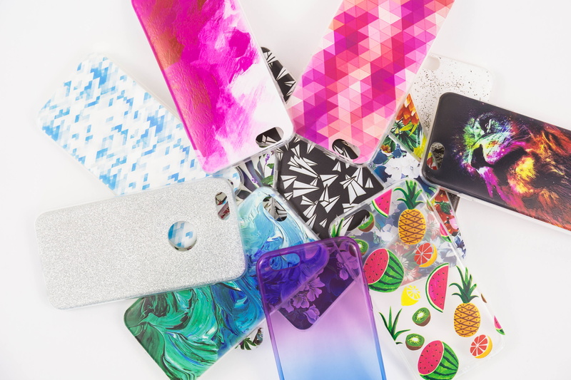 gift box, textile, table, wrapping paper, close-up, phone cases, fun, color, creativity, still life, high angle view, design, no people, choice, fashion