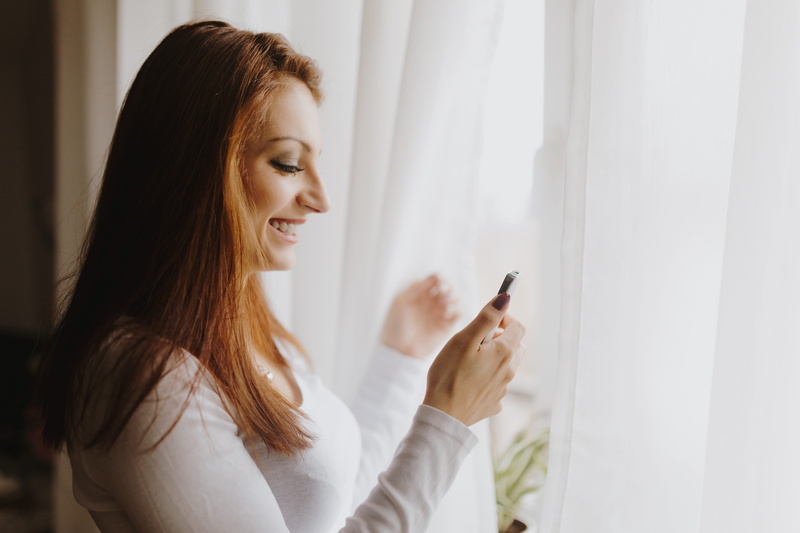 one person, using, girl, beautiful, woman, mobile phone, businesswoman, portable information device, phone, smart phone, caucasian, cellphone, young, smiling