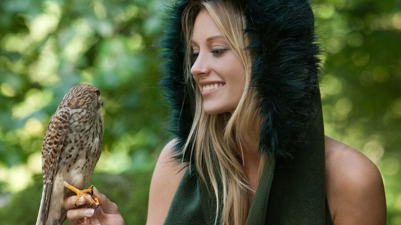 body part, blonde, headshot, holding, trees, birds, women outdoors, young adult, green, young women, Carisha, beauty, top, bird, one animal, portrait, smiling