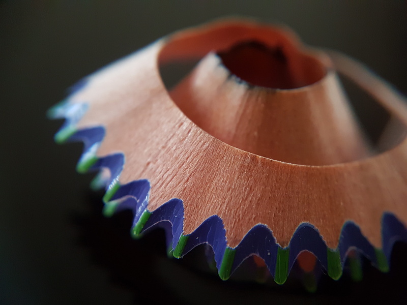 wood - material, shape, single object, pencil, indoors, metal, in a row, black background, studio shot, shaving, design, pattern, curvy, serrated, 4K