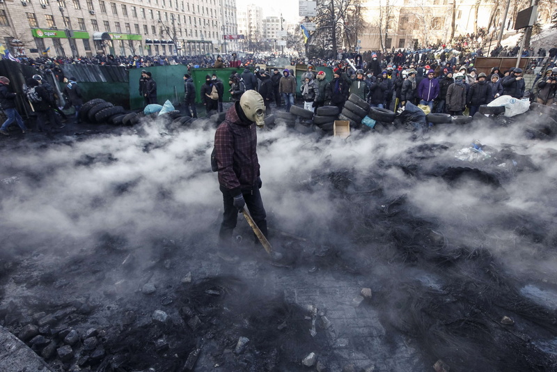 grey, building exterior, Maidan, women, gas, smoke - physical structure, real people, lifestyles, outdoors, nature, day, architecture, city, Ukrainian