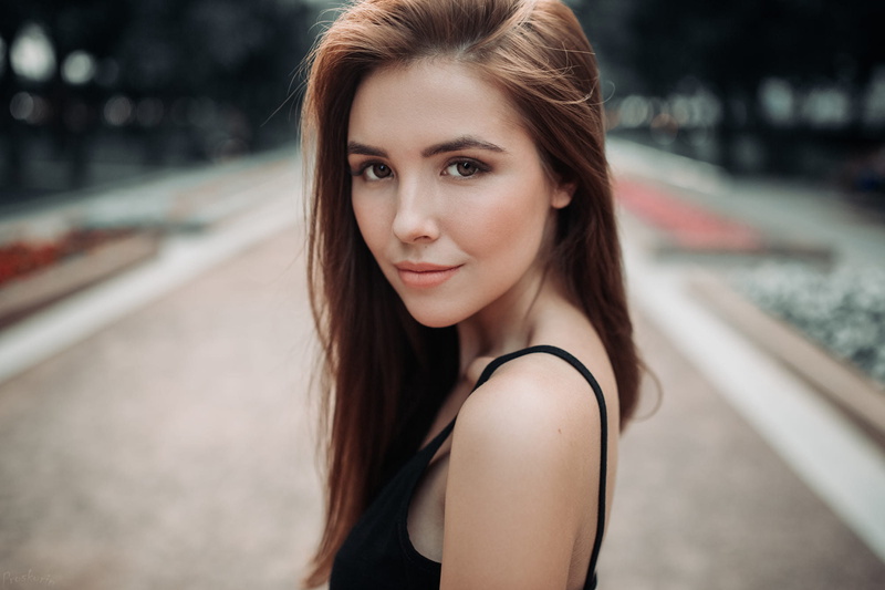 women, smirk, women outdoors, 1080P, Ivan Proskurin, face, brown eyes, no bra, black tops, portrait, long hair, brunette, bokeh