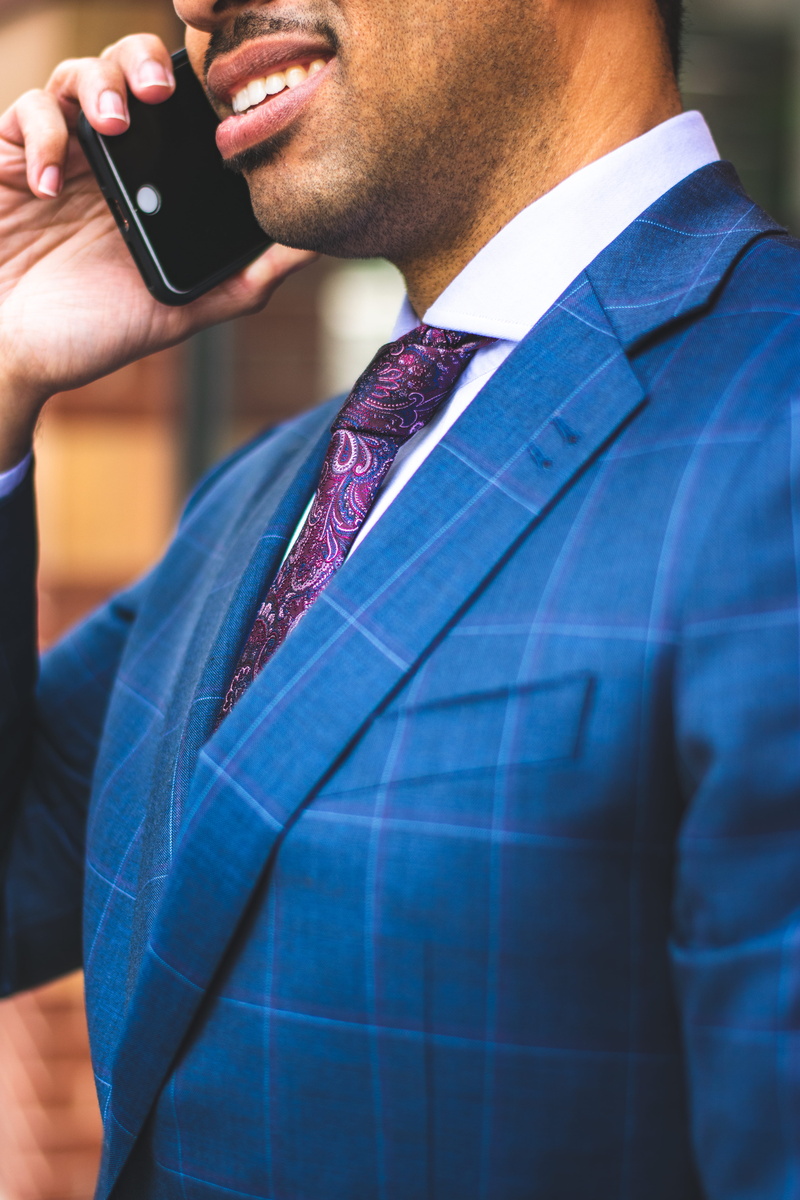 smartphone, formal wear, technology, jacket, midsection, standing, phone, businessman, 5K, holding, real people, using phone, pinstripe suit, mobile phone