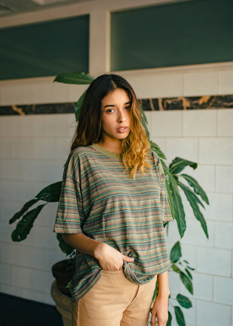 long hair, one person, looking at camera, waist up, 720P, portrait, front view, brown eyes, hair, hairstyle, hands in pockets, adult, teenager, young women