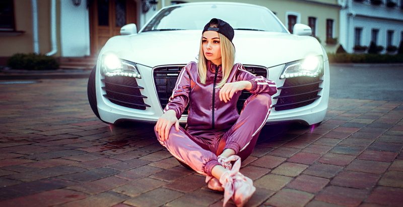 street, beautiful woman, one person, looking into the distance, women outdoors, blonde, mode of transportation, cobblestone, sportswear, paving stone, Kirill Bukrey