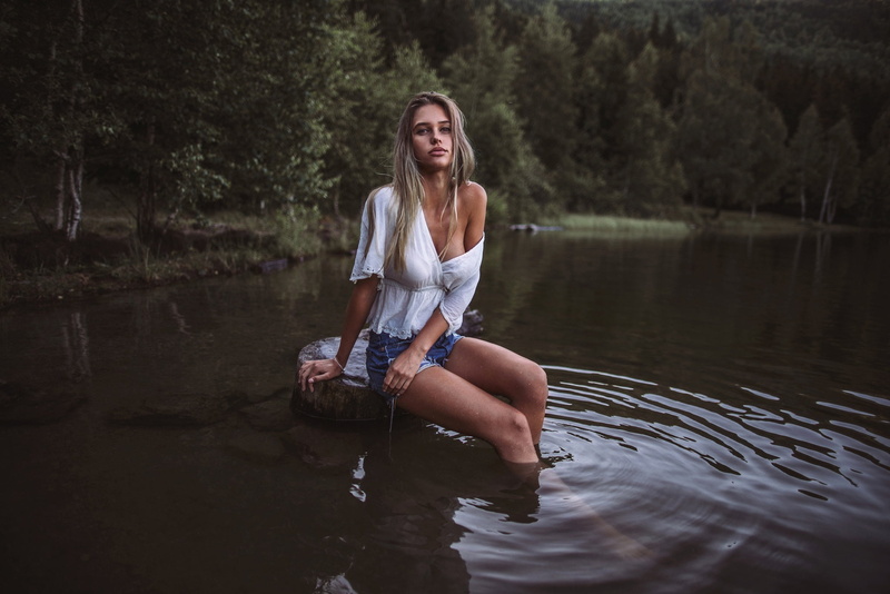 sitting, Paul Toma, in the water, forest, slim, 1080P, blonde, wet, trees, shorts, blouse, river, hairstyle, photoshoot, shore, nature, legs