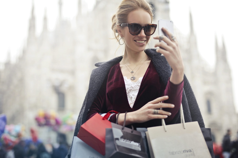 top, one person, fun, young adult, sleeved, city, beauty, glasses, fashion, using phone, smartphone, young women, jewel, smiling, wear, picture, blur, wireless technology