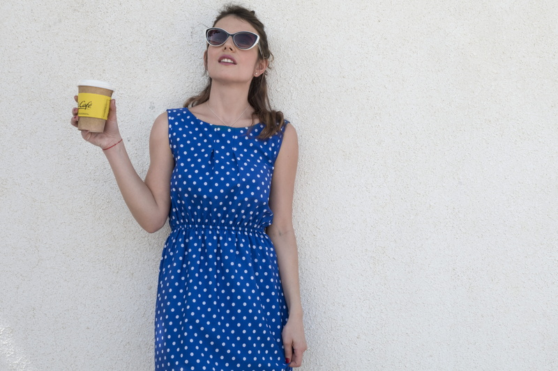 front view, brunette, drink, girl, young adult, casual, beauty, fashion, pose, polka dot, lifestyle, woman, women, dress, pretty, holding, wear, copy space