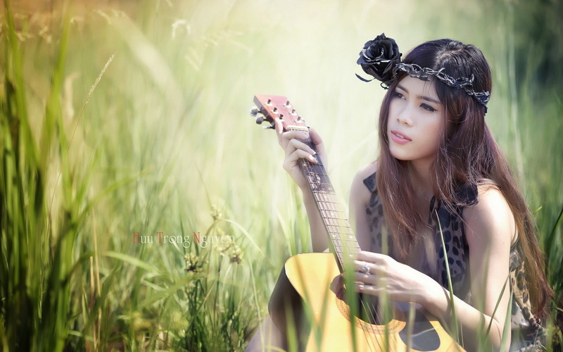 plant, leisure activity, women outdoors, guitar, Huu Trong Nguyen, nature, young women, real people, outdoors, lifestyles, hair, beauty, land, women, musical instrument