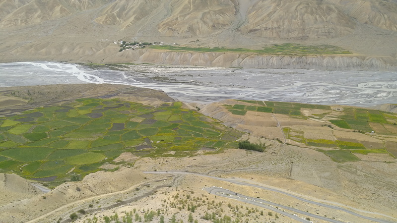 high angle view, beauty in nature, outdoors, green color, day, river, environment, valley, scenics - nature, road, aerial view, plant, land, tranquil scene