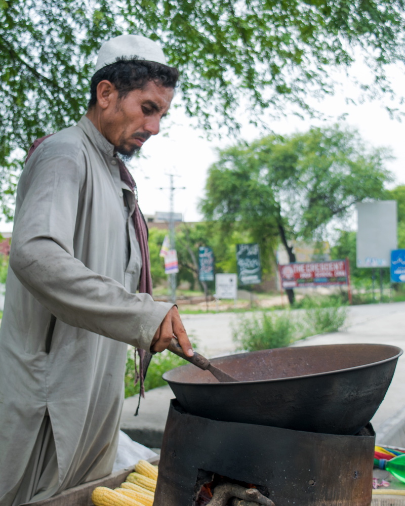real people, adult, occupation, person, poor, looking, people, unhappy, three quarter length, preparing food, nature, mature men, tree, countryside, males