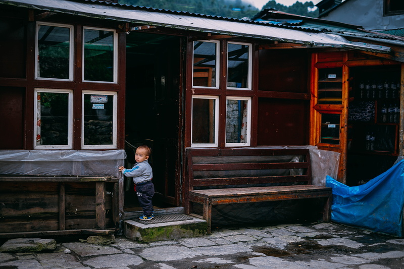 one person, nepal, innocence, building, building exterior, window, casual clothing, life, architecture, children, 5K, lifestyles, trekking, women, phakding