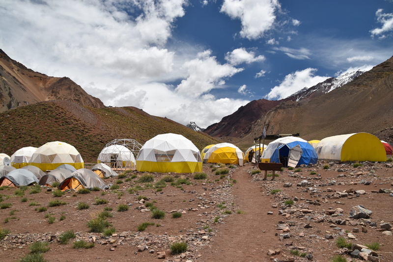 sky, tourism, mountain, non-urban scene, cloud - sky, mountain range, aconcagua, scenics - nature, beauty in nature, land, climbing, built structure, outdoors