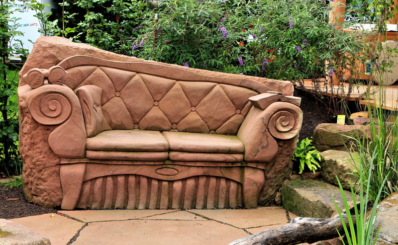 old, carving - craft product, flowers, no people, growth, wood, statue, animal representation, park, architecture, representation, built structure, art and craft