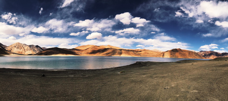 tranquil scene, sky, cloud - sky, beauty in nature, environment, mountain peak, mountain range, semi-arid, idyllic, sea, pangong tso, tranquility, lagoon
