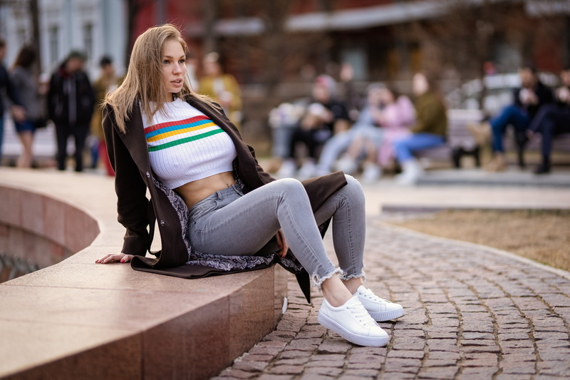 long hair, outdoors, Ilya Pistoletov, belly, no bra, crop top, red nails, brown jacket, looking away, jeans, 2K, women outdoors, people, coats, nipples through clothing