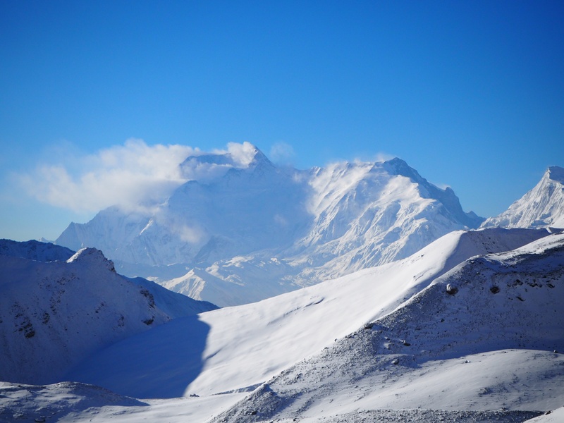 non-urban scene, sunlight, mountain peak, mountaineering, sky, annapurna circuit, nature, himalaya, mountain range, beauty in nature, blue, mount, peak