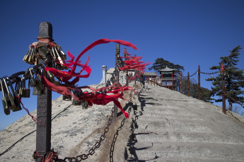 architecture, clear sky, blue, moutain, travel, no people, transportation, travel destinations, sunlight, red, day, bicycle, large group of objects, 5K