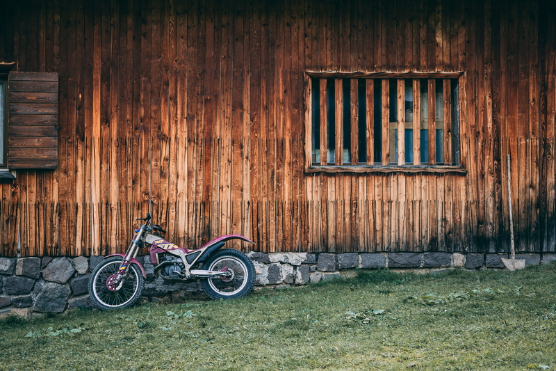building, red, built structure, wood, iron, motorbike, day, building exterior, house, spoke, wood - material, architecture, transportation, alloy wheel