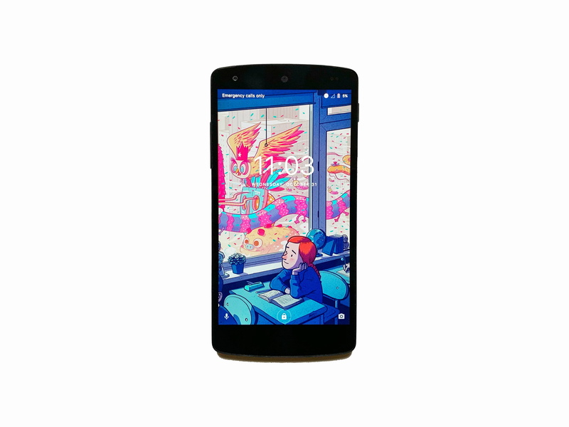 cut out, no people, indoors, nexus 5, multi colored, communication, copy space, nexu, black, technology, portable information device, mobile phone, smart phone
